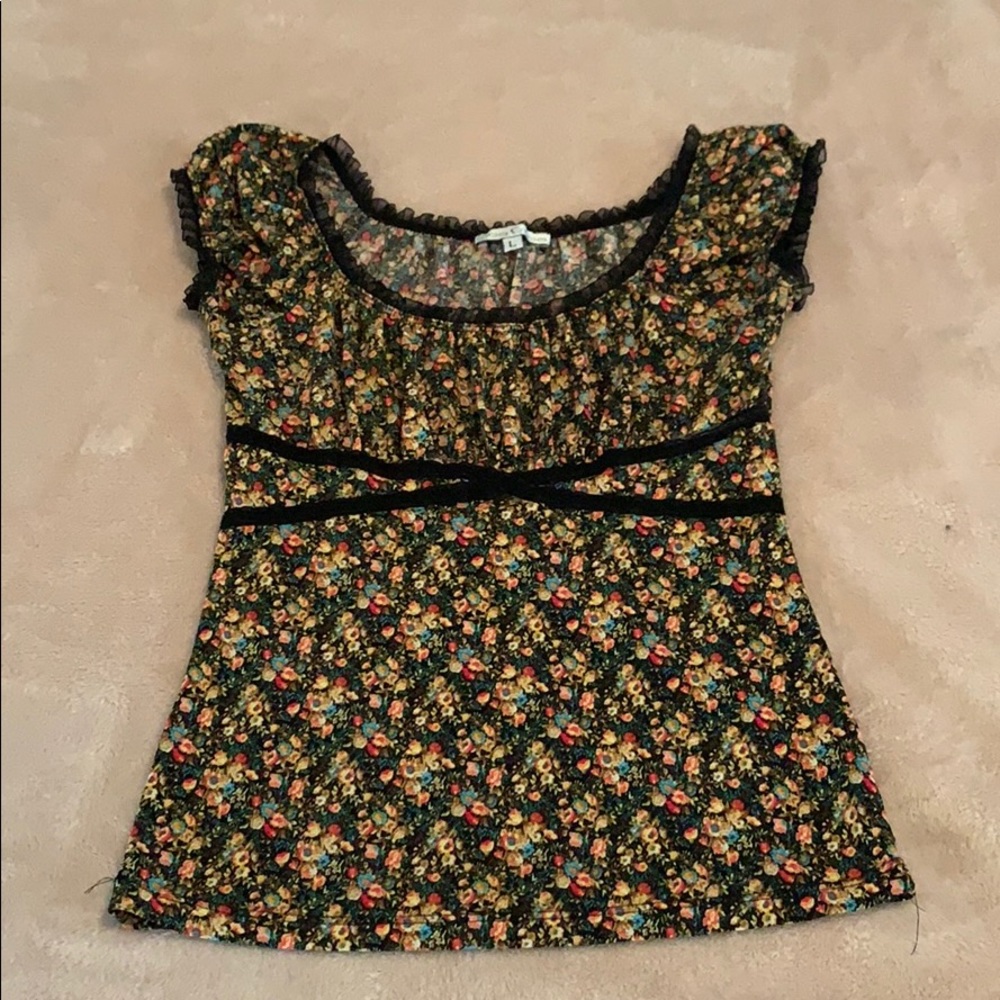 Soft floral ruffle and lace top.